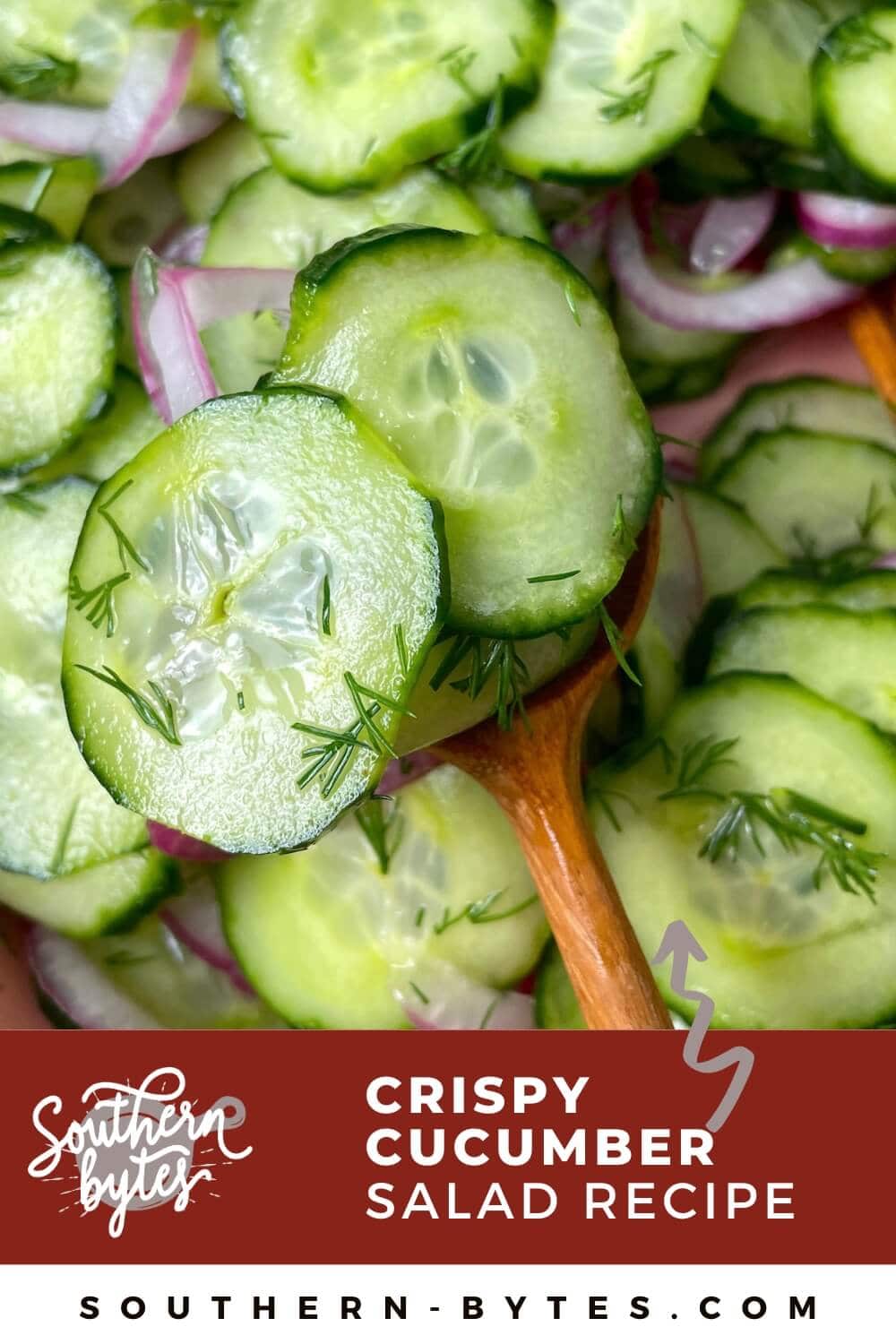 A pin image of a spoon scooping up some quick pickled crispy cucumbers in cucumber salad.