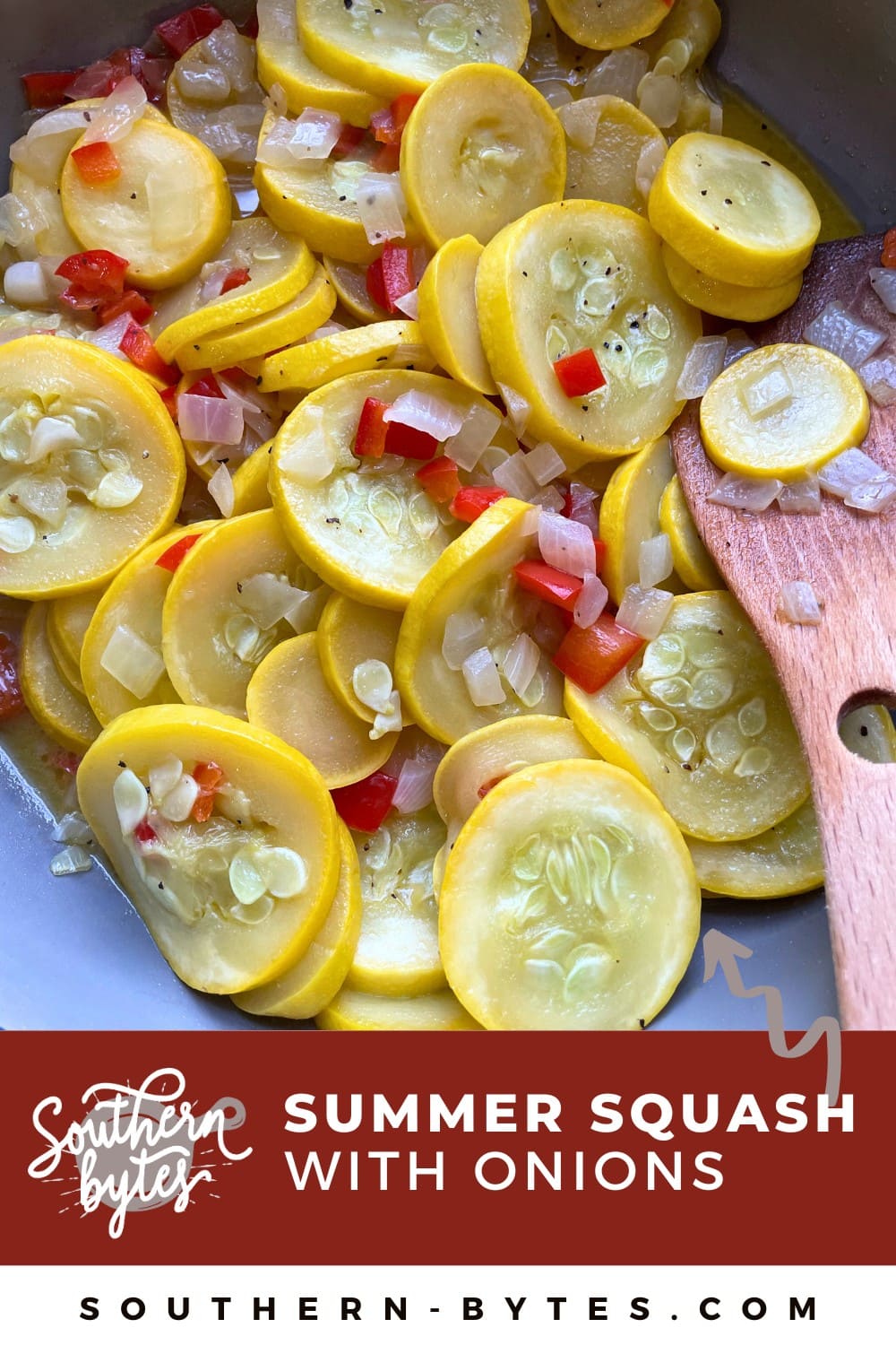 A pin image of a blue and gray frying pan with summer squash, red bell peppers, and onions in it with a wooden spoon.