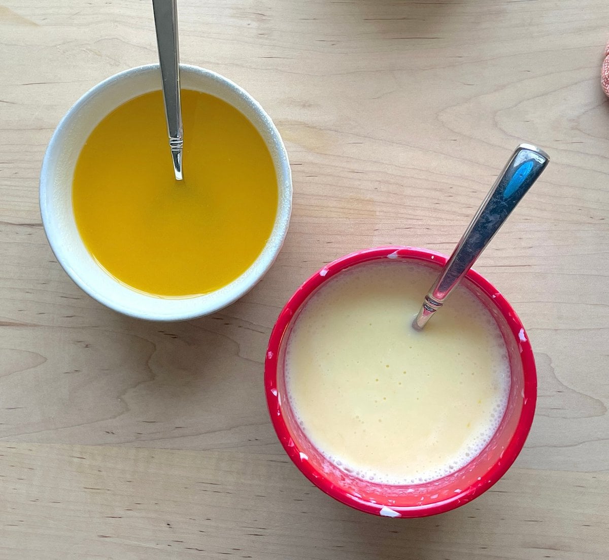 Wet ingredients to make cornbread - sugar and butter and eggs and buttermilk.