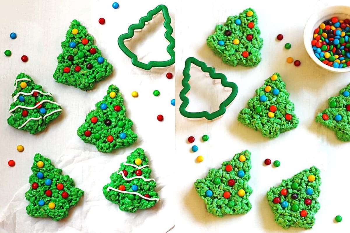 Decorated green Rice Krispie treat Christmas trees with candy ornaments and white frosting, next to tree-shaped cookie cutters and a bowl of colorful candies on a white background.