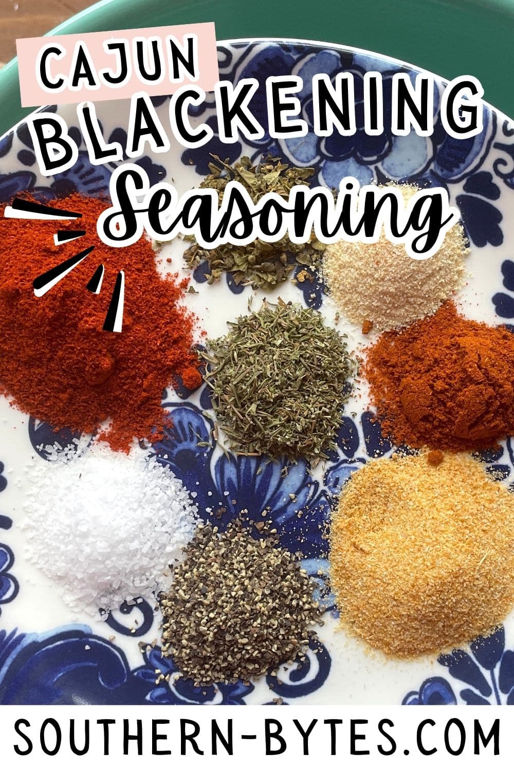 A pin image of a colorful assortment of spices for Cajun blackening seasoning, arranged on a decorative plate.