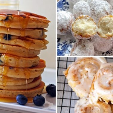 Stack of blueberry pancakes with syrup, powdered sugar-dusted donuts, and iced cinnamon rolls displayed together.